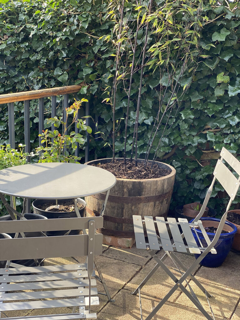 Bistro table on terrace long garden ideas